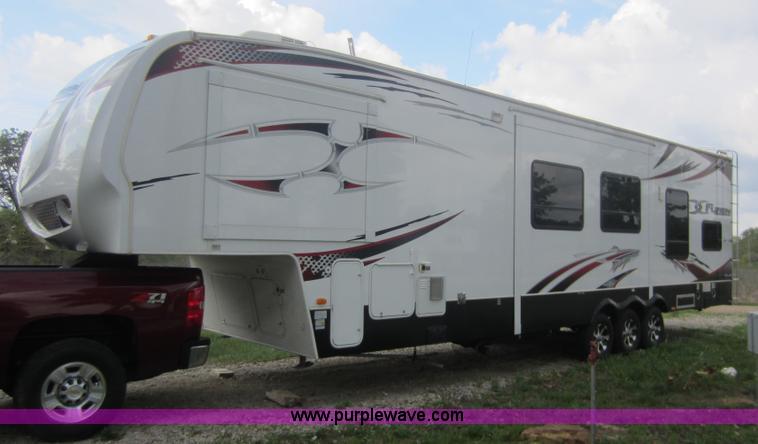 image for item C5426 2011 Keystone Fuzion toy hauler travel trailer