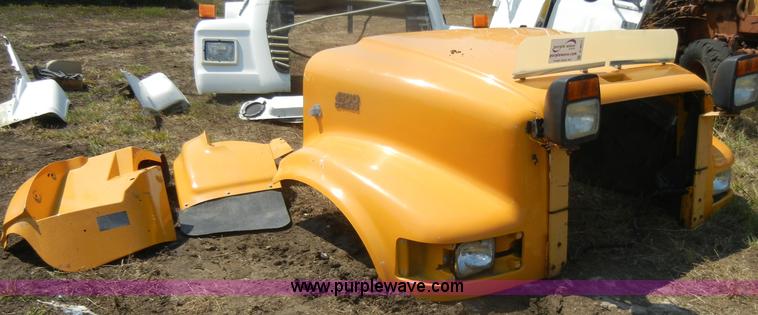 image for item D4611 International 4900 DT466 hood with fenders