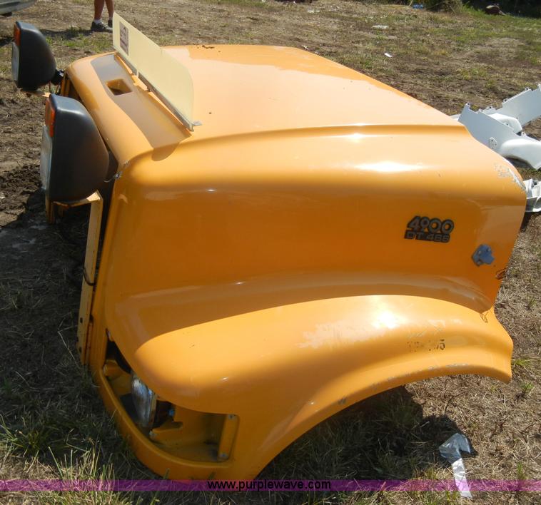 image for item D4611 International 4900 DT466 hood with fenders