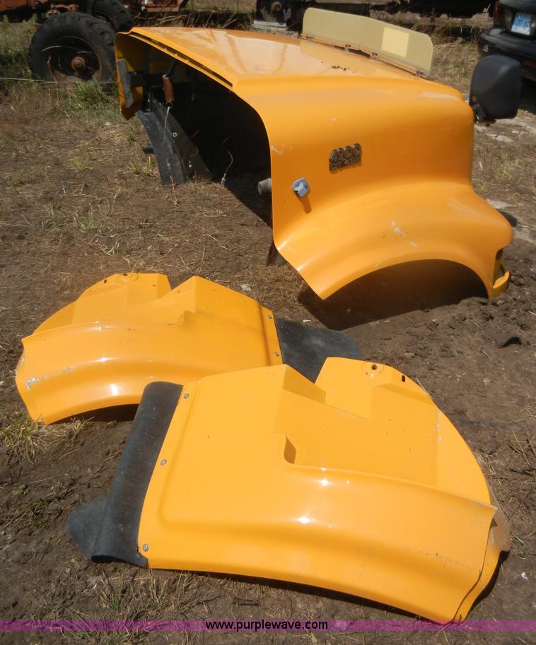 image for item D4611 International 4900 DT466 hood with fenders