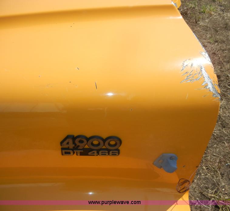 image for item D4611 International 4900 DT466 hood with fenders