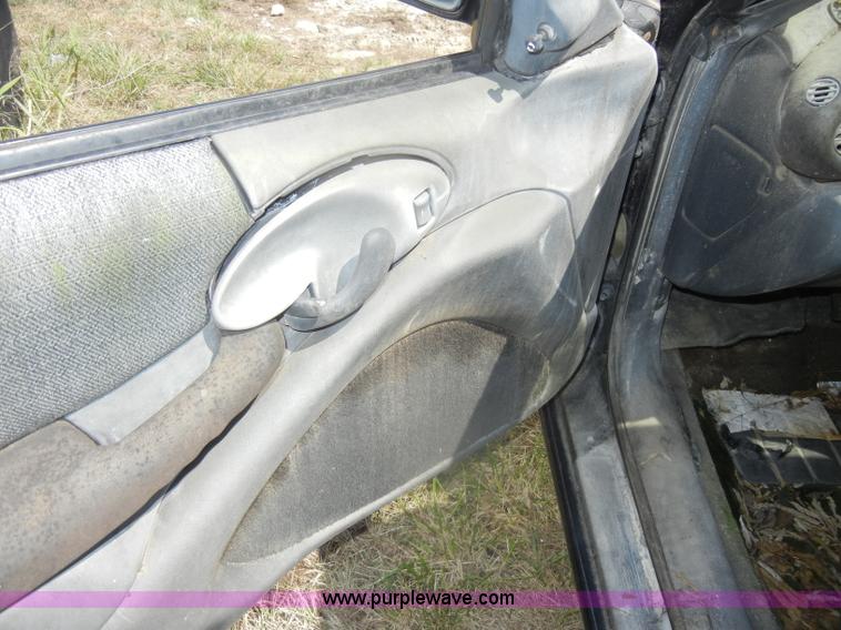 image for item D5634 1996 Pontiac Sunfire SE convertible