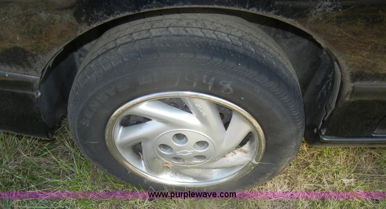 image for item D5634 1996 Pontiac Sunfire SE convertible