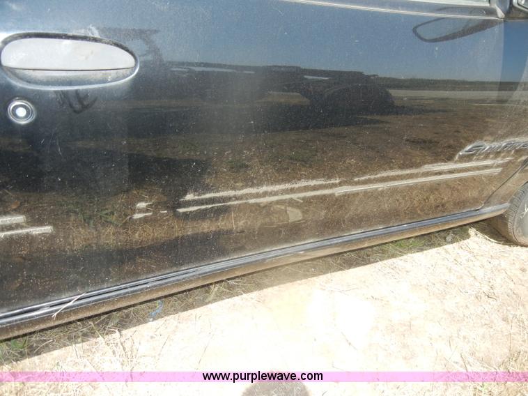 image for item D5634 1996 Pontiac Sunfire SE convertible