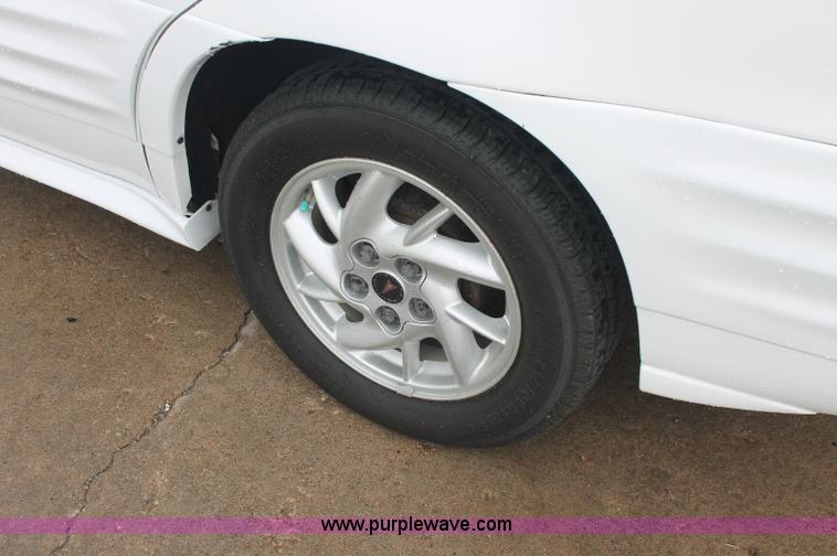 image for item E2077 2002 Pontiac Grand Am SE