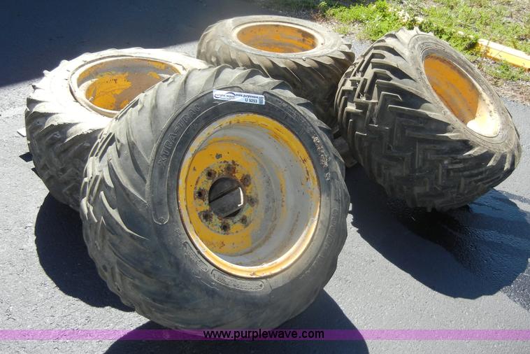 image for item U9253 (4) Goodyear Xtra-Trac tires with rims