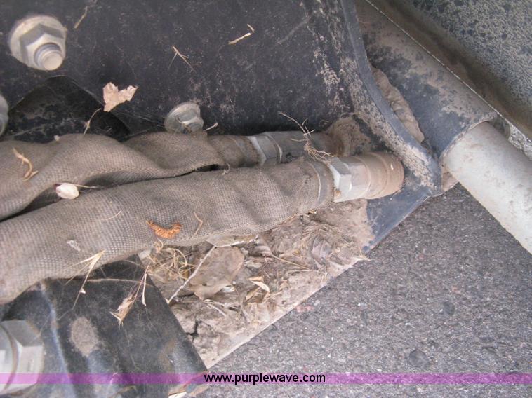 image for item B8087 2005 Bobcat LT213 trencher skid steer attachment