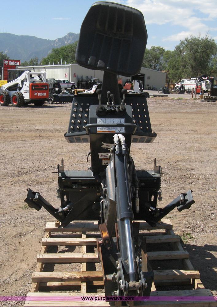image for item B8090 Bobcat M06 backhoe skid steer attachment