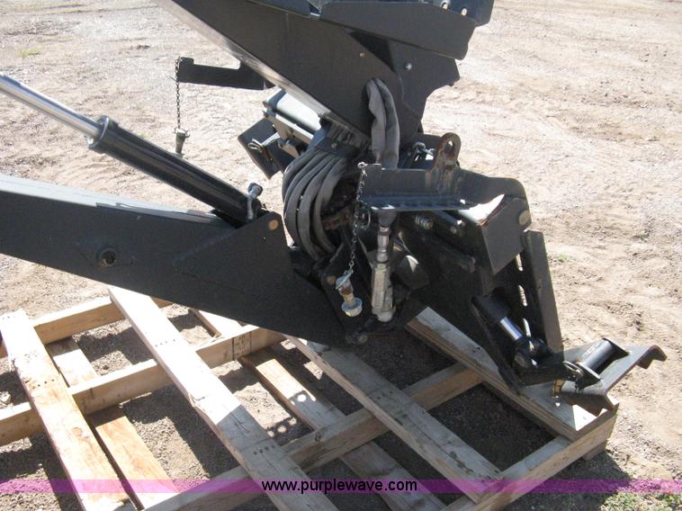 image for item B8090 Bobcat M06 backhoe skid steer attachment