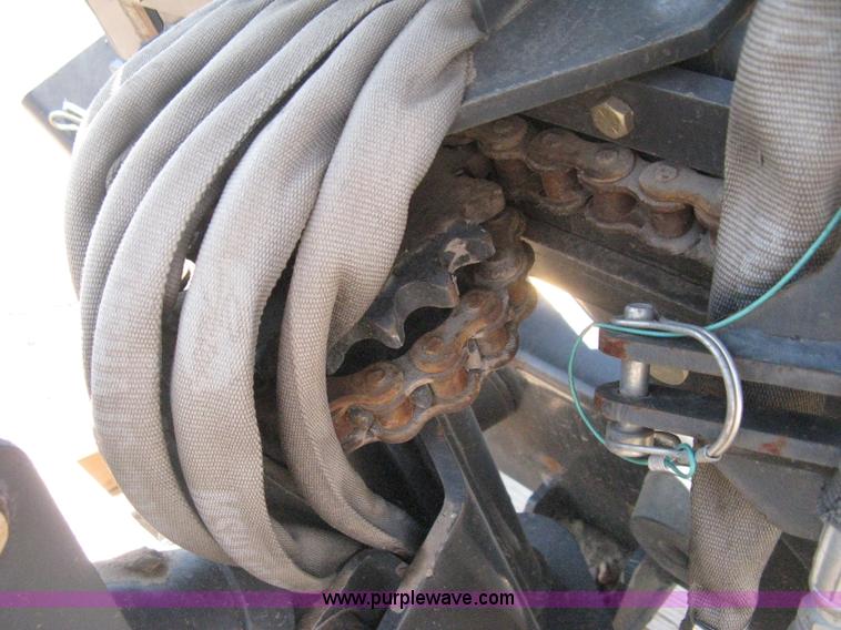 image for item B8090 Bobcat M06 backhoe skid steer attachment