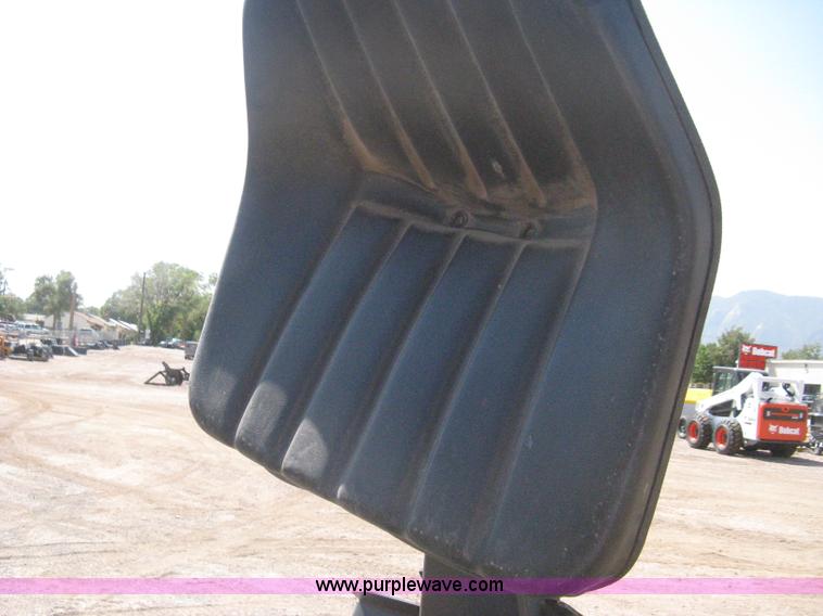 image for item B8090 Bobcat M06 backhoe skid steer attachment