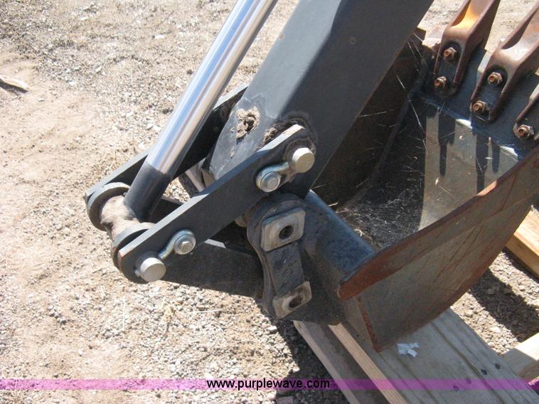 image for item B8090 Bobcat M06 backhoe skid steer attachment
