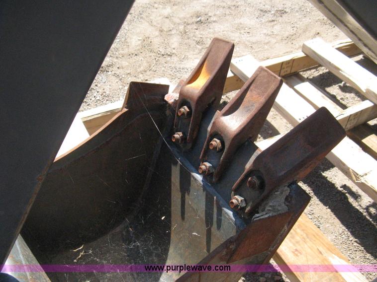 image for item B8090 Bobcat M06 backhoe skid steer attachment