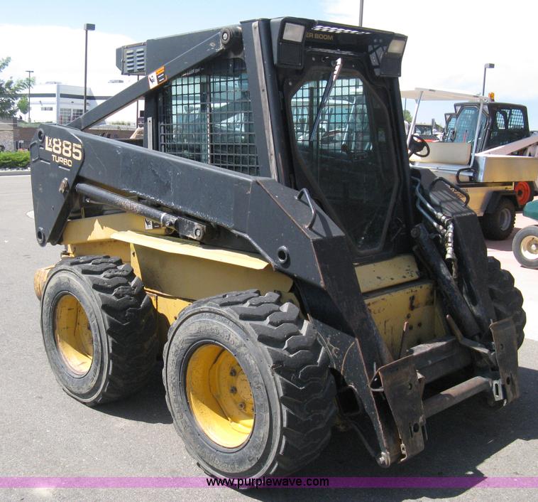 image for item B8106 1997 New Holland LX885 Turbo Super Boom skid steer
