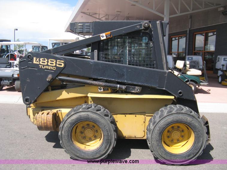 image for item B8106 1997 New Holland LX885 Turbo Super Boom skid steer