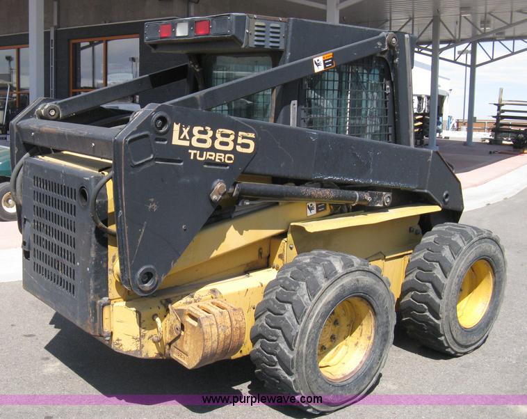 image for item B8106 1997 New Holland LX885 Turbo Super Boom skid steer