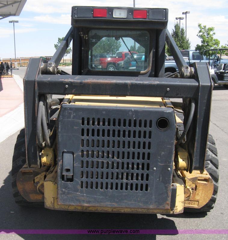 image for item B8106 1997 New Holland LX885 Turbo Super Boom skid steer