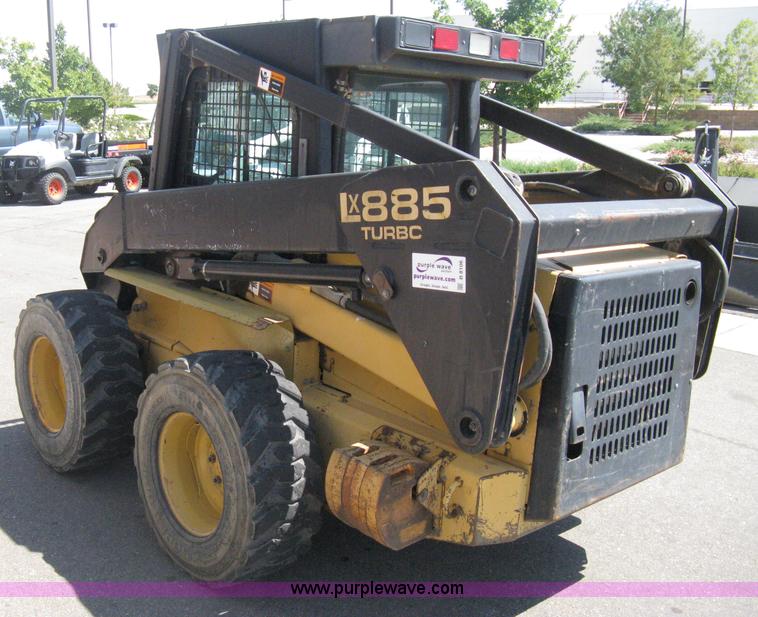 image for item B8106 1997 New Holland LX885 Turbo Super Boom skid steer