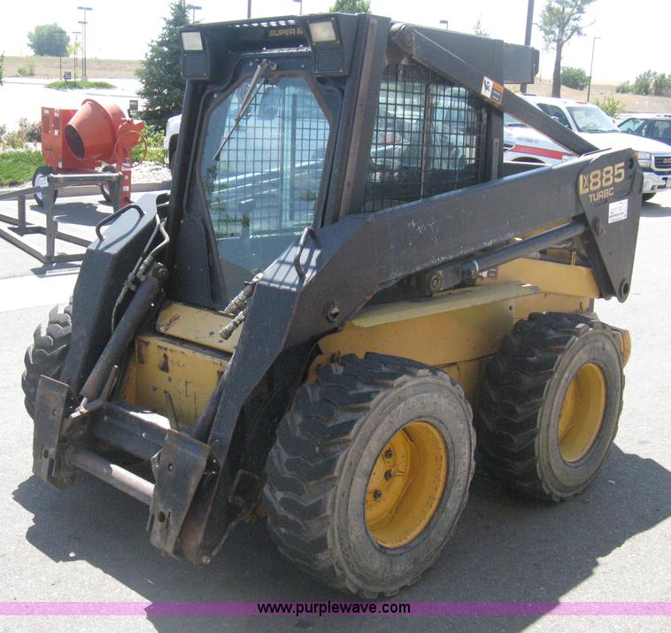 image for item B8106 1997 New Holland LX885 Turbo Super Boom skid steer