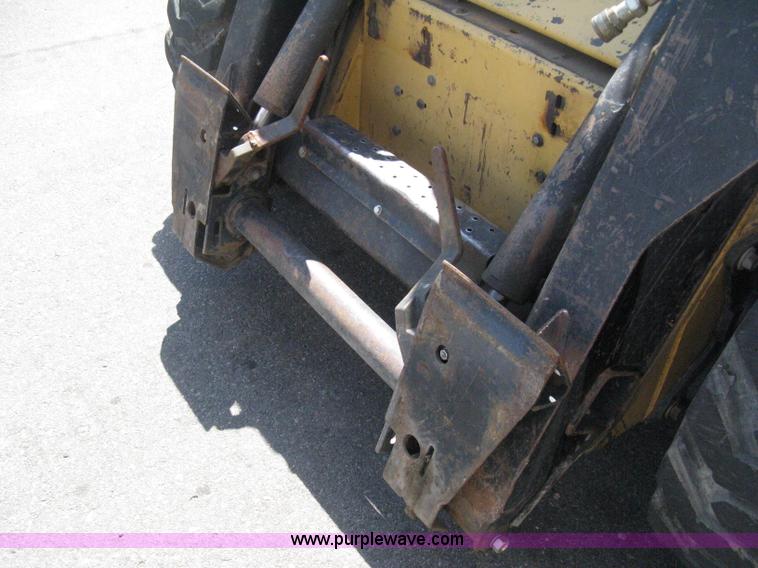 image for item B8106 1997 New Holland LX885 Turbo Super Boom skid steer