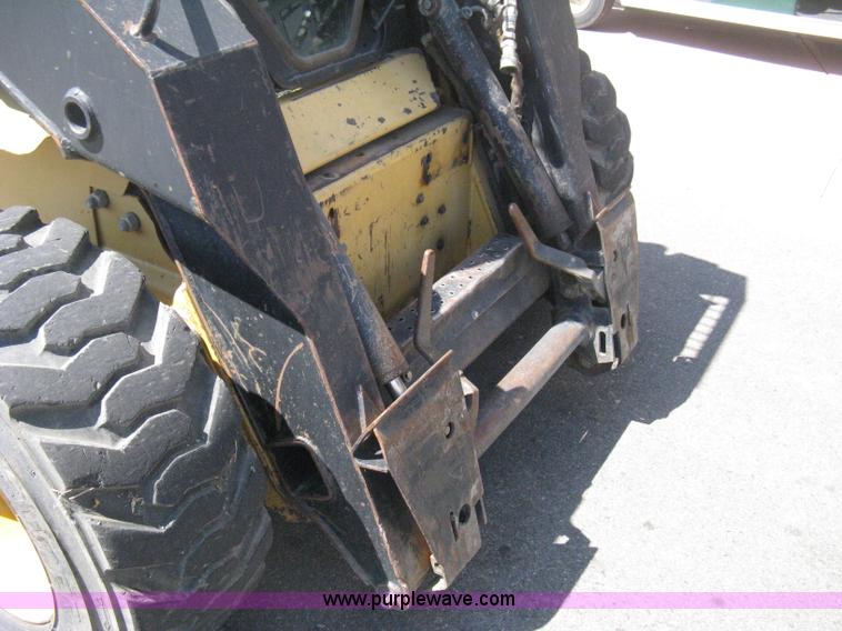 image for item B8106 1997 New Holland LX885 Turbo Super Boom skid steer