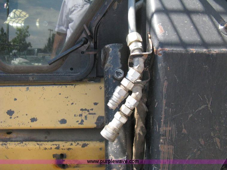 image for item B8106 1997 New Holland LX885 Turbo Super Boom skid steer