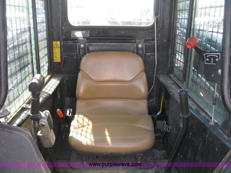 image for item B8106 1997 New Holland LX885 Turbo Super Boom skid steer