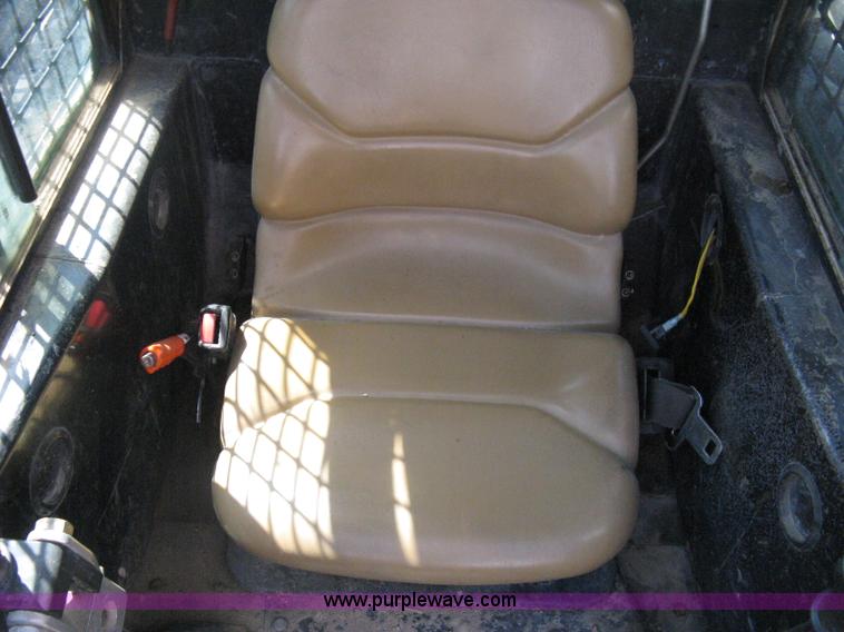 image for item B8106 1997 New Holland LX885 Turbo Super Boom skid steer