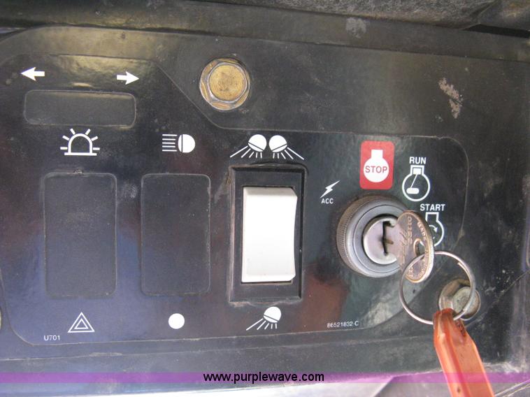 image for item B8106 1997 New Holland LX885 Turbo Super Boom skid steer