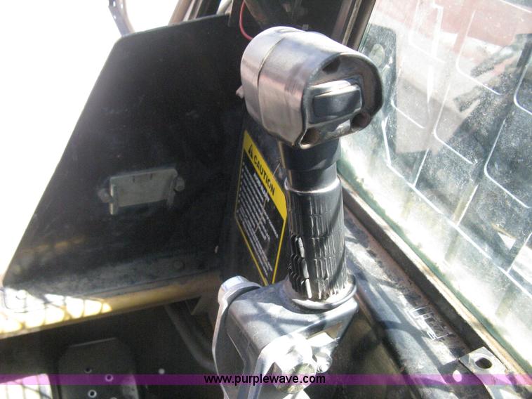 image for item B8106 1997 New Holland LX885 Turbo Super Boom skid steer