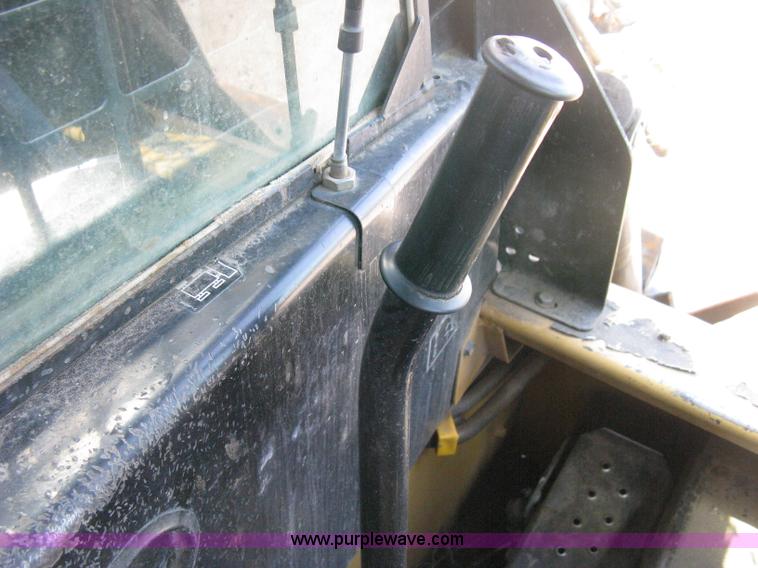 image for item B8106 1997 New Holland LX885 Turbo Super Boom skid steer