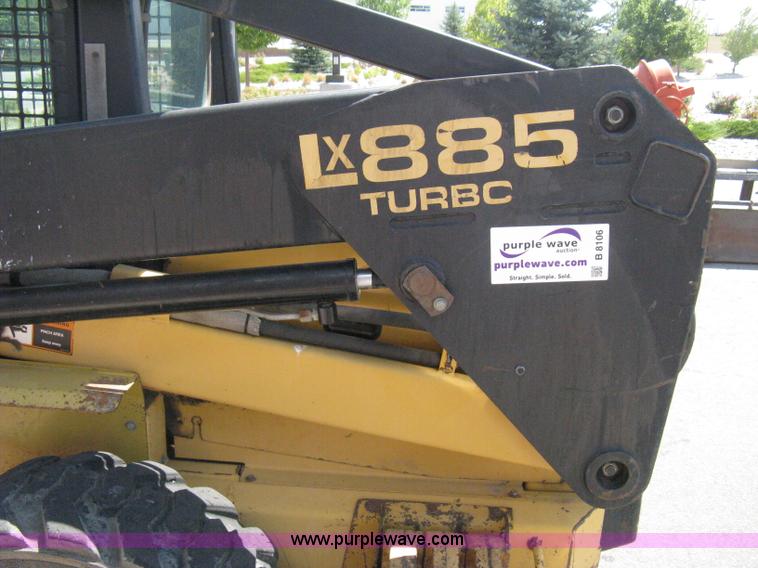 image for item B8106 1997 New Holland LX885 Turbo Super Boom skid steer