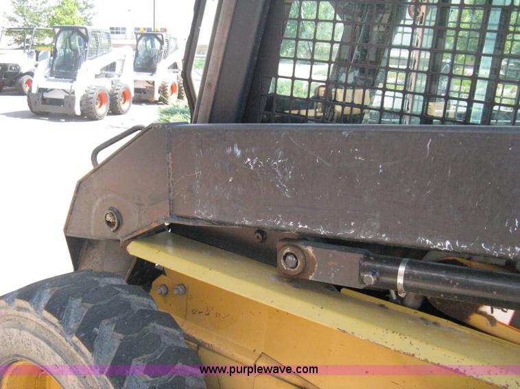 image for item B8106 1997 New Holland LX885 Turbo Super Boom skid steer