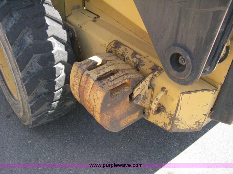 image for item B8106 1997 New Holland LX885 Turbo Super Boom skid steer