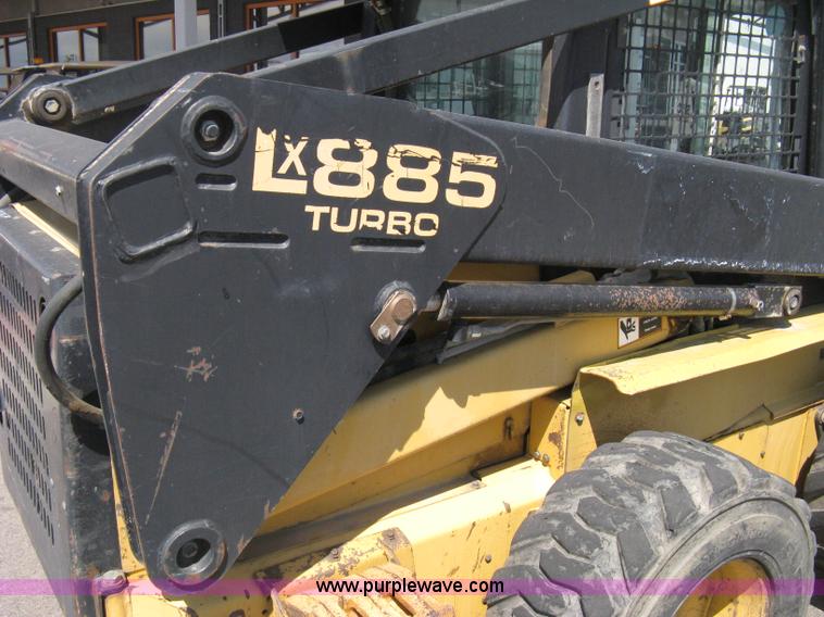 image for item B8106 1997 New Holland LX885 Turbo Super Boom skid steer