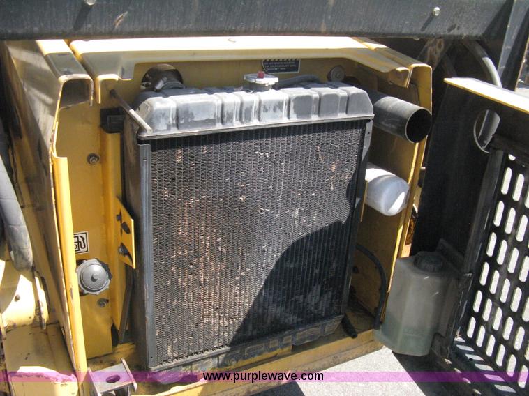 image for item B8106 1997 New Holland LX885 Turbo Super Boom skid steer