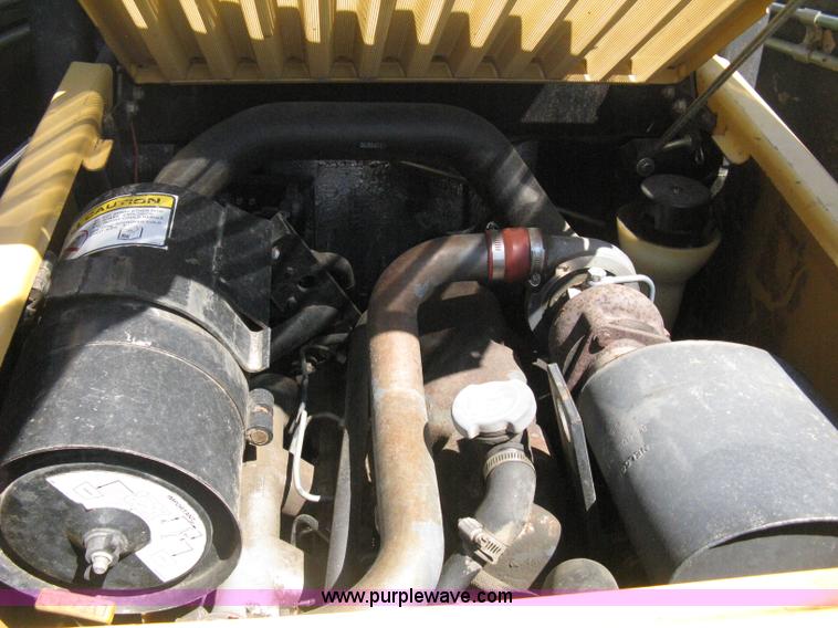 image for item B8106 1997 New Holland LX885 Turbo Super Boom skid steer