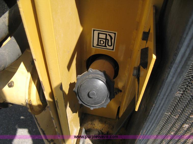 image for item B8106 1997 New Holland LX885 Turbo Super Boom skid steer