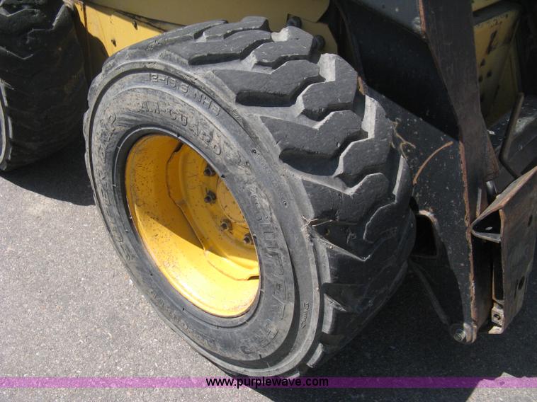 image for item B8106 1997 New Holland LX885 Turbo Super Boom skid steer