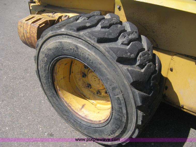image for item B8106 1997 New Holland LX885 Turbo Super Boom skid steer