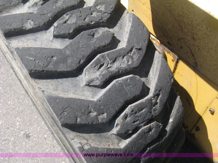 image for item B8106 1997 New Holland LX885 Turbo Super Boom skid steer