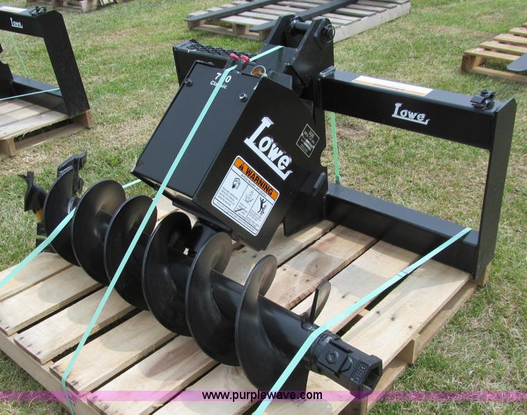 Lowe 750CH hydraulic auger skid steer attachment in Knapp, WI Item