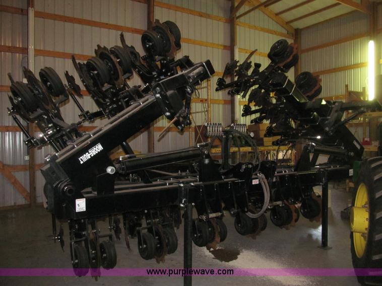 image for item B5219 2012 Moore-built Yetter 12 row strip tiller