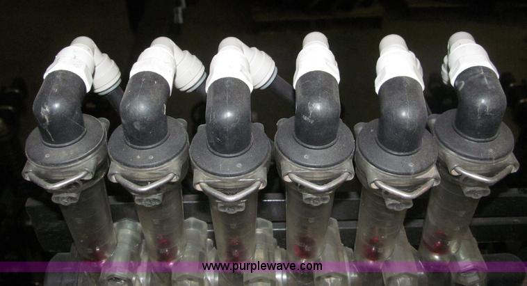 image for item B5219 2012 Moore-built Yetter 12 row strip tiller