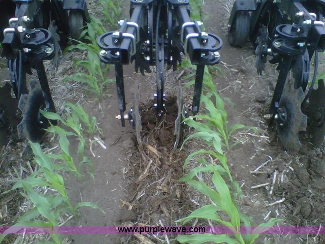 image for item B5219 2012 Moore-built Yetter 12 row strip tiller