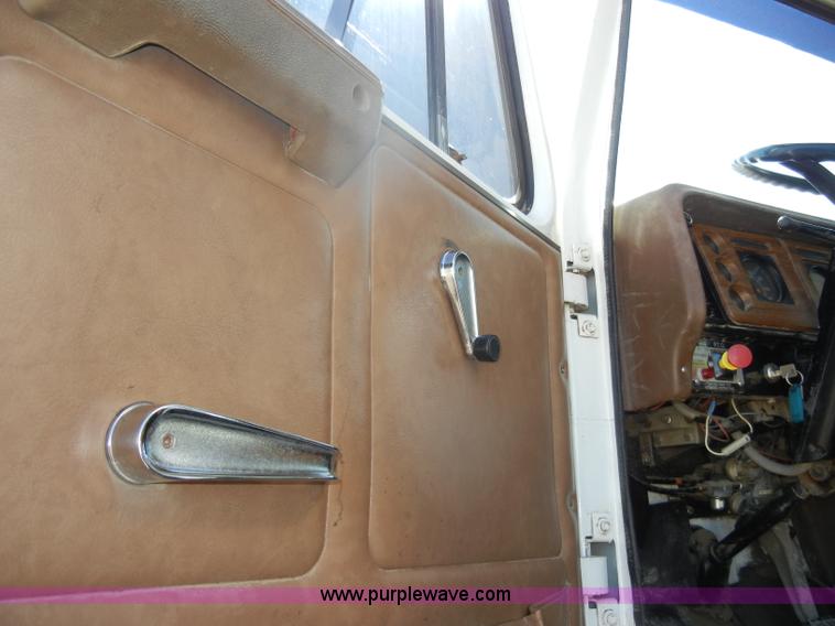 image for item D4619 1982 International 1754 Easy-Rider 1600C Loral spreader truck