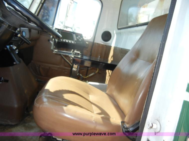 image for item D4619 1982 International 1754 Easy-Rider 1600C Loral spreader truck