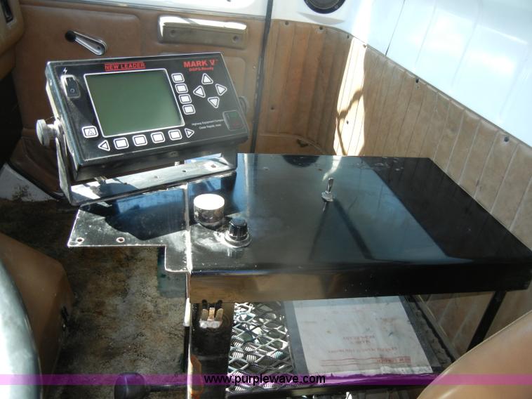 image for item D4619 1982 International 1754 Easy-Rider 1600C Loral spreader truck