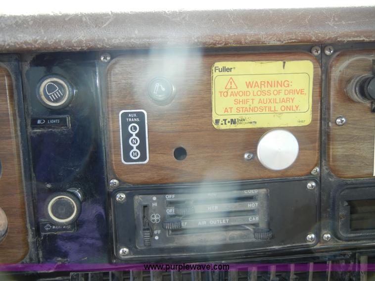 image for item D4619 1982 International 1754 Easy-Rider 1600C Loral spreader truck