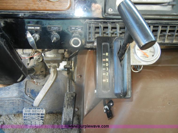 image for item D4619 1982 International 1754 Easy-Rider 1600C Loral spreader truck